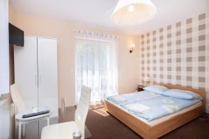 Posteľ alebo postele v izbe v ubytovaní Villa Tara