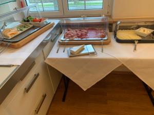 Kuchyň nebo kuchyňský kout v ubytování Hotel Il David