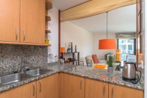 A kitchen or kitchenette at Costabravaforrent Balco 2