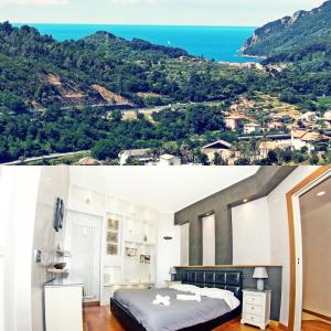 1 dormitorio con cama y vistas al océano en The sea from the hills, en Casarza Ligure