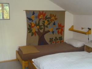Postel nebo postele na pokoji v ubytování Haus am Weiher