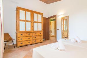 A bed or beds in a room at Son Ferragut