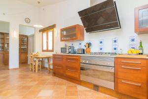 A kitchen or kitchenette at Son Ferragut