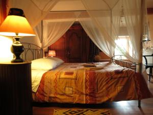 Postel nebo postele na pokoji v ubytování La Claverie