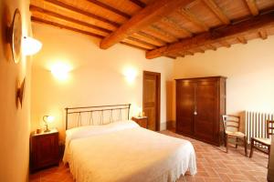 Posteľ alebo postele v izbe v ubytovaní Agriturismo Podere San Gregorio