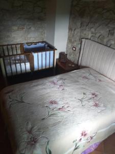 מיטה או מיטות בחדר ב-Appartamento Azzurra