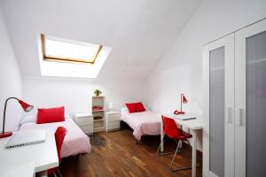 Ένα ή περισσότερα κρεβάτια σε δωμάτιο στο Hostel Palacio