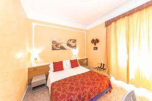A bed or beds in a room at Downtown Accommodation