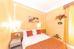 A bed or beds in a room at Downtown Accommodation