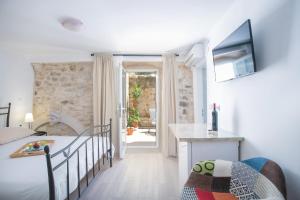 Posteľ alebo postele v izbe v ubytovaní Guest house Mendi