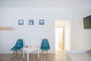 Televízia a/alebo spoločenská miestnosť v ubytovaní Guest house Mendi
