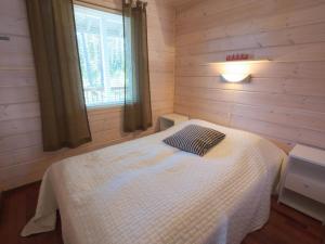 Postel nebo postele na pokoji v ubytování Holiday Home Ylläs iisakki as- 10a by Interhome