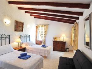 Posteľ alebo postele v izbe v ubytovaní Holiday Home Fonsala by Interhome