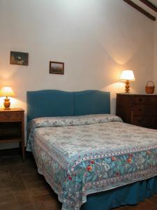 Postel nebo postele na pokoji v ubytování Vignagrande Agriturismo