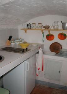 A kitchen or kitchenette at Castello di Grotti