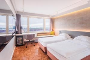 Кровать или кровати в номере Original Sokos Hotel Viru