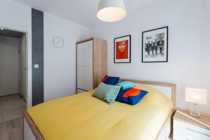 A bed or beds in a room at Harmo no. 1 - Sunny Apartment with big terrace