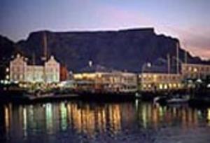 a view of a harbor with a large building at WhiteSands in Cape Town