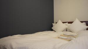 Postel nebo postele na pokoji v ubytování Web Hotel Tokyo Asakusabashi