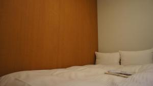 Postel nebo postele na pokoji v ubytování Web Hotel Tokyo Asakusabashi
