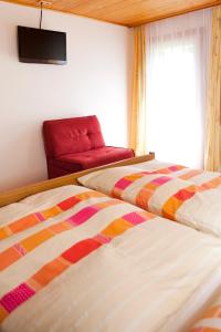A bed or beds in a room at Ferienhaus Meissnitzer