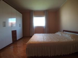 Postel nebo postele na pokoji v ubytování Sunny apartment Jukic with sea view