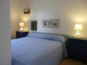 Postel nebo postele na pokoji v ubytování Residence Salina