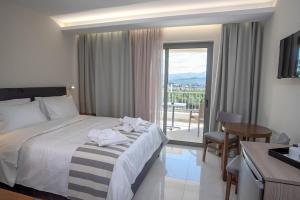 Posteľ alebo postele v izbe v ubytovaní Nafplia Terra