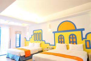 Uma cama ou camas num quarto em Yujian Kending Tese Homestay