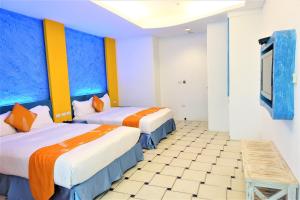 Uma cama ou camas num quarto em Yujian Kending Tese Homestay