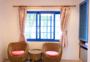 Uma área de estar em Yujian Kending Tese Homestay