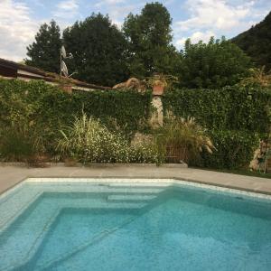 The swimming pool at or close to B&B Pieve Degli Artisti