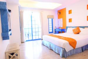Uma cama ou camas num quarto em Yujian Kending Tese Homestay