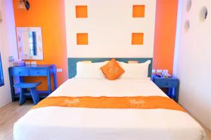 Uma cama ou camas num quarto em Yujian Kending Tese Homestay