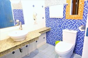 Uma casa de banho em Yujian Kending Tese Homestay