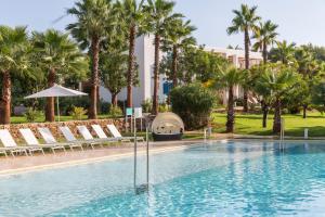 Piscina en o cerca de Cala Llenya Resort Ibiza