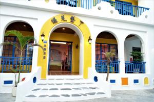 A fachada ou entrada de Yujian Kending Tese Homestay