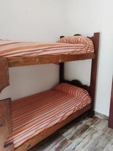 Postel nebo postele na pokoji v ubytování Casa Roma