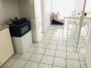 A kitchen or kitchenette at Korona Beach Apartments II