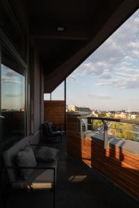Rõdu või terrass majutusasutuses Hotel River Park
