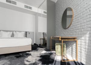Voodi või voodid majutusasutuse Hotel River Park toas