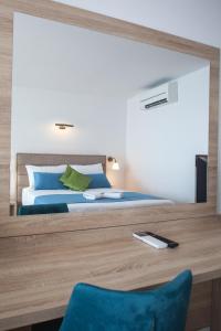 Postel nebo postele na pokoji v ubytování Villa Cascada