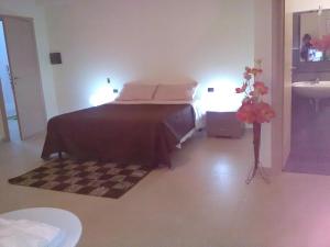 A bed or beds in a room at Vossìgnuria