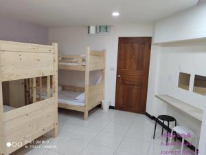 Letto o letti in una camera di Simple life hostel