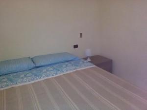 A bed or beds in a room at Vossìgnuria