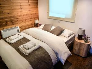 Postel nebo postele na pokoji v ubytování Vasiliou House Krimenos