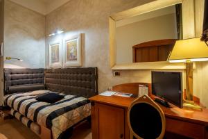 Postel nebo postele na pokoji v ubytování Hotel Columbia Wellness & Spa