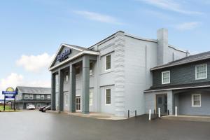 a rendering of the exterior of a hotel at Days Inn by Wyndham Saint John in Saint John
