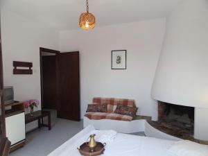 Posteľ alebo postele v izbe v ubytovaní Hotel Vrionis