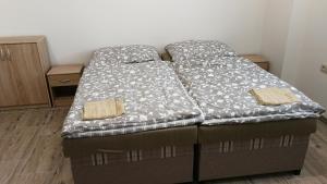 Posteľ alebo postele v izbe v ubytovaní Apartmánové ubytovanie VKF